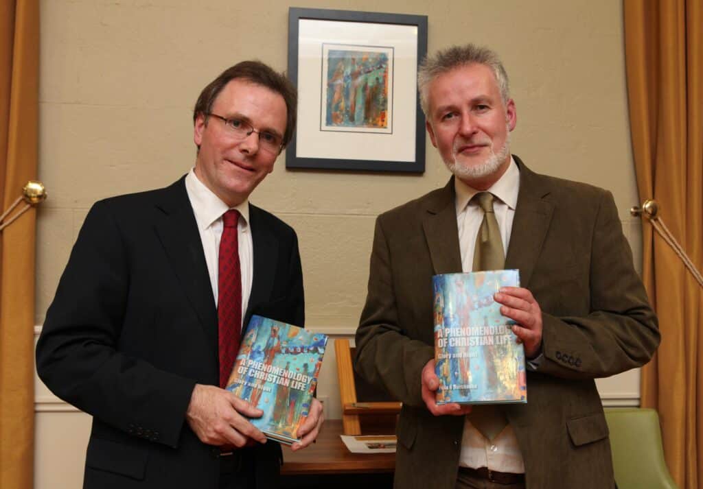 Prof. Felix Ó Murchadha (left) with Prof. Tim Mooney (UCD) Book launch. Photograph by Aengus McMahon